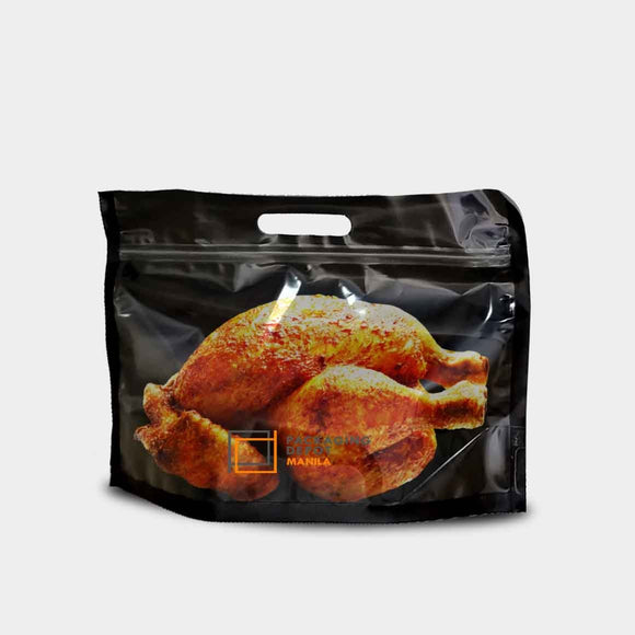 Roast chicken packed in a black chicken bag