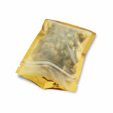 An open matte gold flat pouch with showing its contents