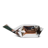 Silver coffee gusset bag laying flat side view