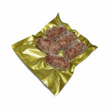 Iso view of longganisa sealed in a gold vacuum bag 