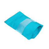 Blue green stand up pouch window empty left side view