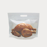 Roast chicken packed in a transparent chicken bag