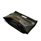 Angled view of the bottom part of a black chicken bag