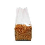 Unsealed transparent gusset bag filled with nuts