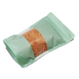 Mint Green stand up pouch window matte packed with nuts