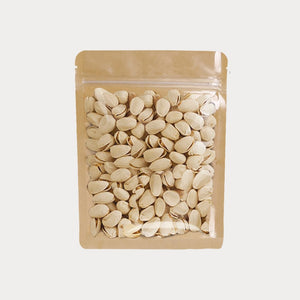 Kraft flat pouch with a transparent front filled with nuts