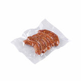 Vacuum bags with various types of sealed food items 